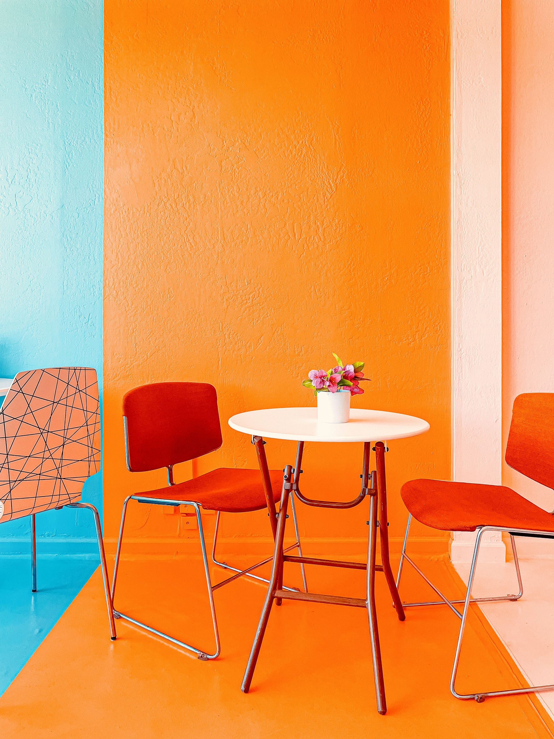 brown wooden table with chairs